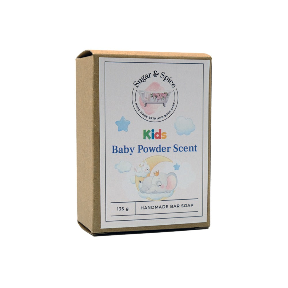 A packaged bar of baby powder scent soap with the Sugar & Spice brand visible on the label. The package is marked as 'Kids' and indicates the soap is handmade.