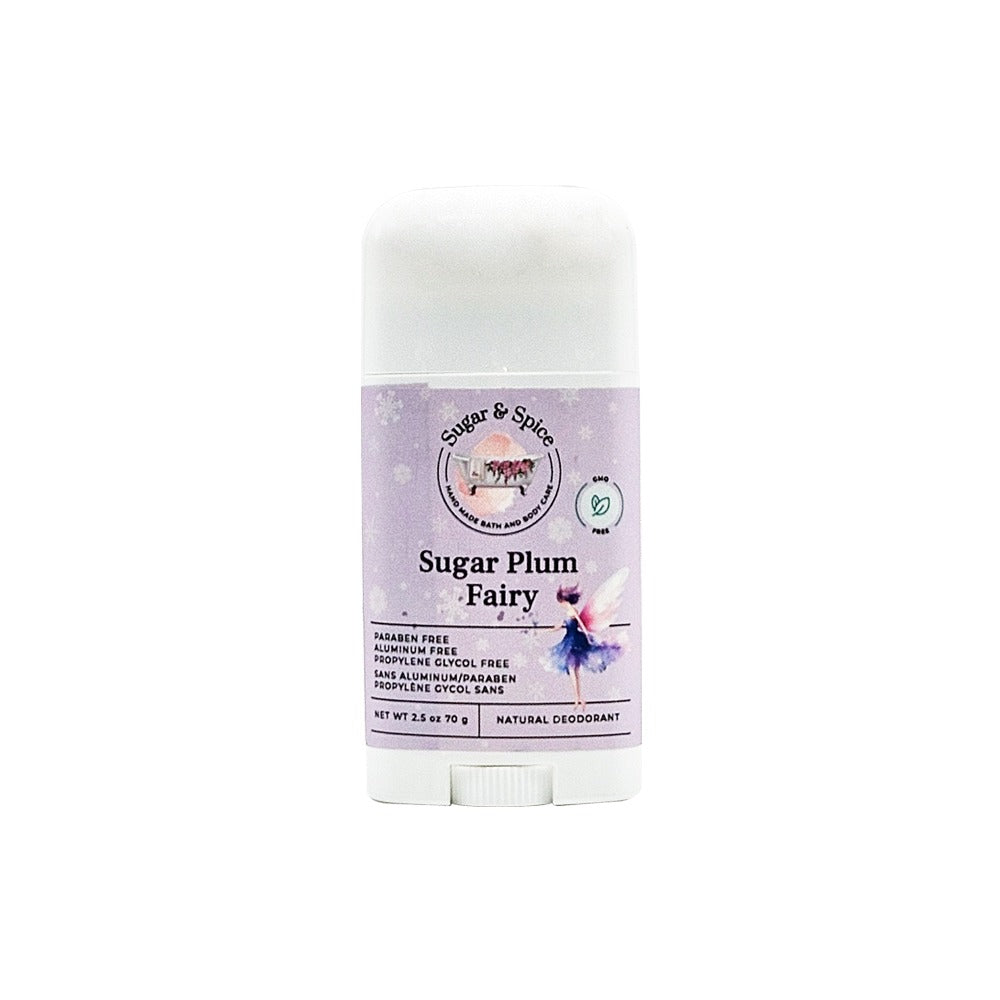 A stick of Sugar Plum Fairy natural deodorant with a purple label featuring a fairy illustration.