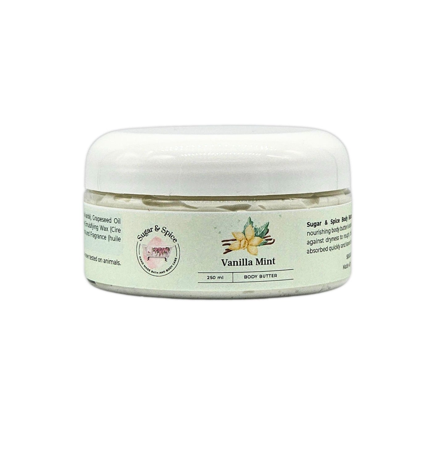 A jar of Vanilla Mint Body Butter with a white lid, labeled with the brand Sugar & Spice Bath & Body, product name, and scent.