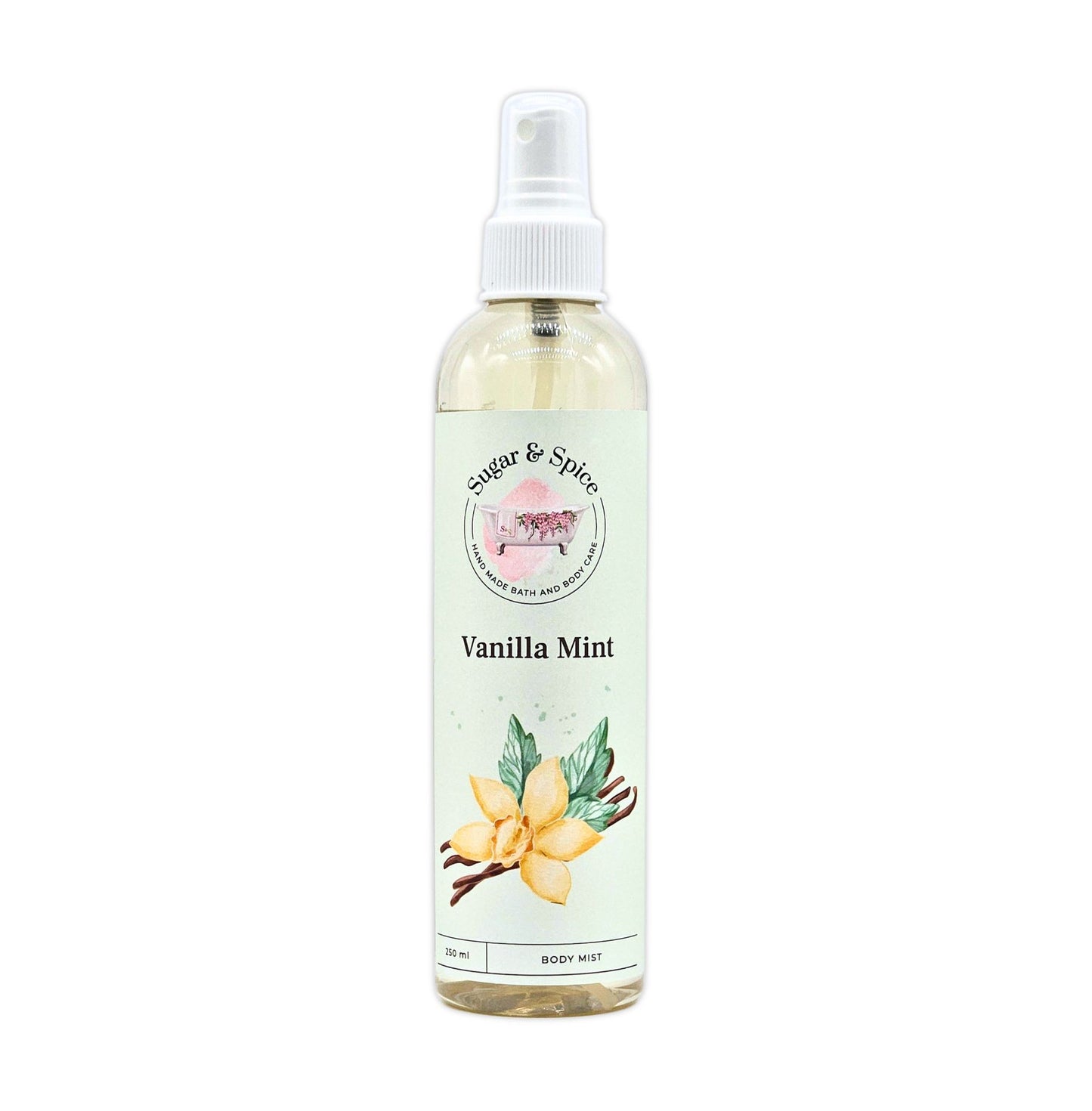 A bottle of Vanilla Mint Body Mist with a white spray nozzle. The label shows the name 'Vanilla Mint' and an illustration of a vanilla flower.