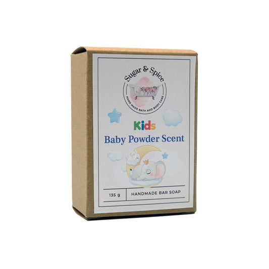 A packaged bar of baby powder scent soap with the Sugar & Spice brand visible on the label. The package is marked as 'Kids' and indicates the soap is handmade.