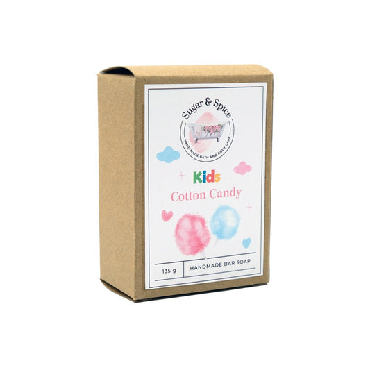 A packaged bar of Cotton Candy soap with a label showing the brand 'Sugar & Spice', the product name 'Kids Cotton Candy', and a graphic of cotton candy. The package is marked '125g handmade bar soap'.