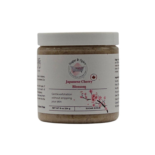 Jar of Japanese Cherry Blossom Sugar Scrub with a white label on a white background