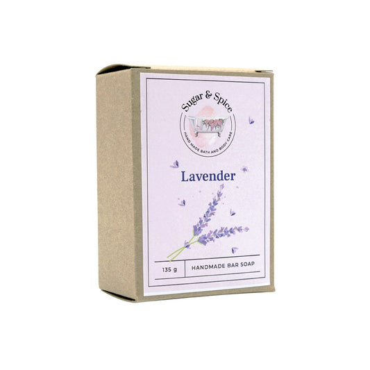 A packaged bar of lavender soap with the brand 'Sugar & Spice' displayed on the box, which is predominantly purple and beige in color with a lavender illustration.
