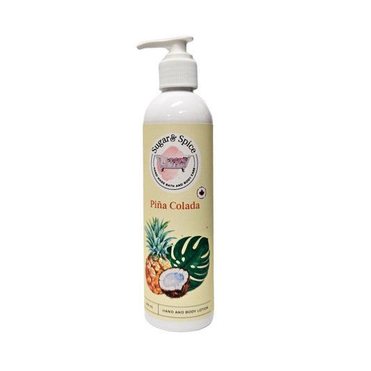 A bottle of Piña Colada body lotion with a pump dispenser, featuring images of a coconut and pineapple and text indicating the scent of the lotion.