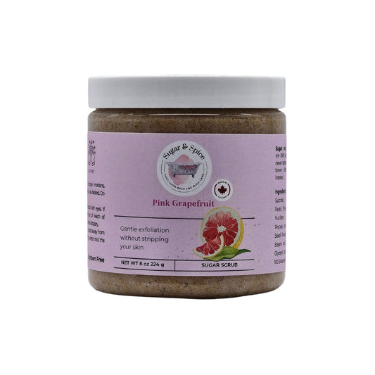 Jar of Pink Grapefruit Sugar Scrub with a white lid on a white background