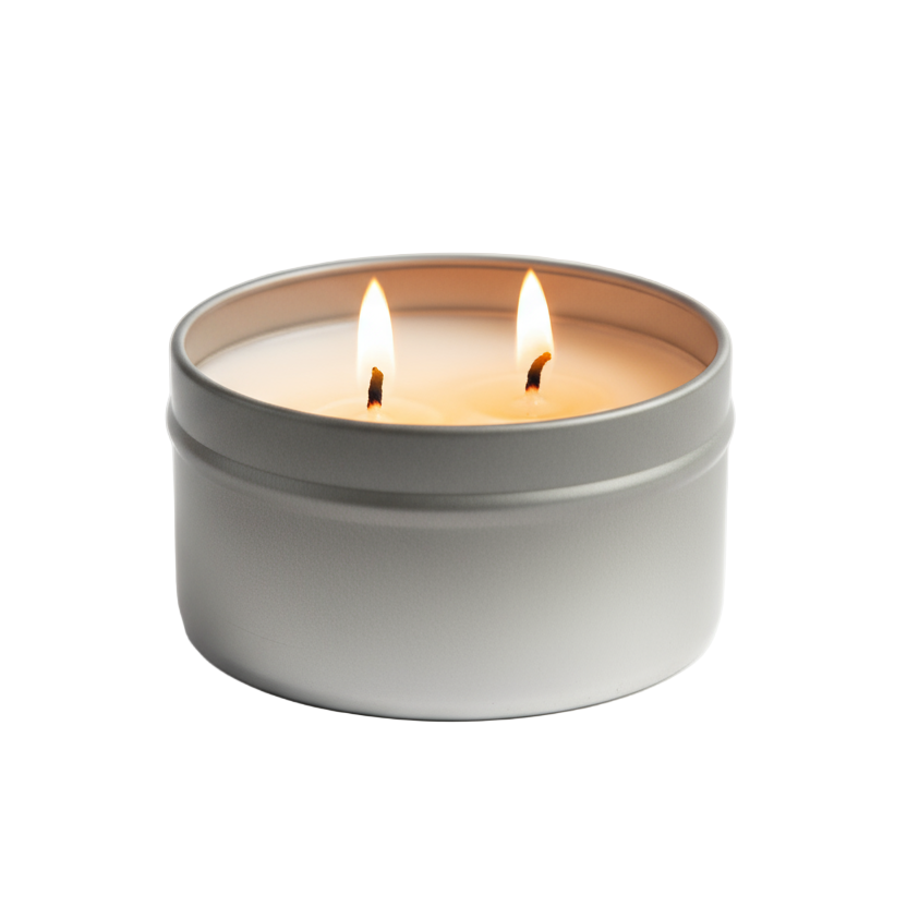 Two wick candle in a metallic tin on a white background