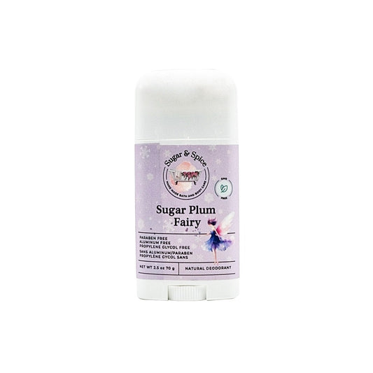 A stick of Sugar Plum Fairy natural deodorant with a purple label featuring a fairy illustration.