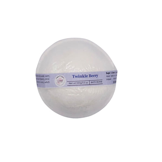 White round Twinkle Berry bath bomb in clear wrapping with a pale purple label.