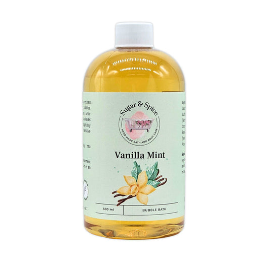 A plastic bottle of Vanilla Mint bubble bath with a label showing the product name and an image of a vanilla flower.