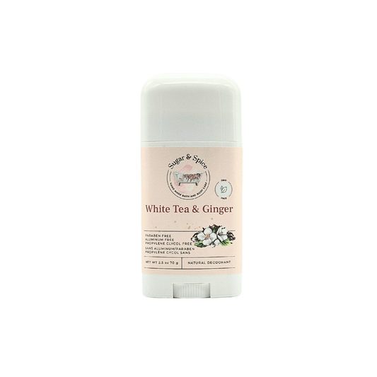 A stick of White Tea & Ginger Natural Deodorant with a white background, featuring product information and branding.