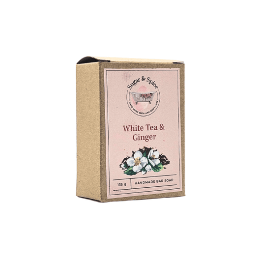 A packaged bar of White Tea & Ginger soap with the brand 'Sugar & Spice' displayed on the label.